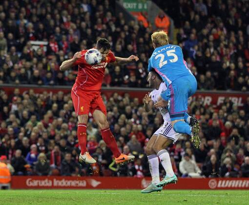 Liverpool s Dejan Lovren scoring his sides second goal League Cup Fourth Round- Liverpool vs Swansea City - Anfield - England - 28th October 2014 - Picture David Klein Sportimage EDITORIAL USE ONLY. No use with unauthorised audio, video, data, fixture lists, club league logos or live services. Online in-match use limited to 120 images, no video emulation. No use in betting, games or single club league player publications.