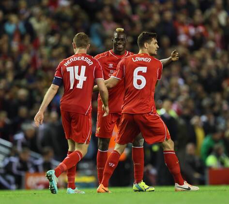 Liverpool s Mario Balotelli celebrates with goalscorer Dejan Lovren League Cup Fourth Round- Liverpool vs Swansea City - Anfield - England - 28th October 2014 - Picture David Klein Sportimage EDITORIAL USE ONLY. No use with unauthorised audio, video, data, fixture lists, club league logos or live services. Online in-match use limited to 120 images, no video emulation. No use in betting, games or single club league player publications.