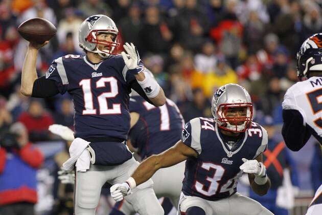 New England Patriots quarterback Tom Brady (12) throws a pass in the first quarter against the Denver Broncos at Gillette Stadium in Foxboro, Massachusetts on November 2, 2014.  BOS2014110202