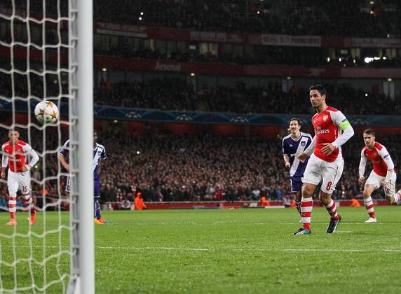 Aktuell Fussball, Champions League, FC Arsenal - RSC Anderlecht Arsenal s Mikel Arteta scoring his sides opening goal - Champions League Group D - Arsenal vs Anderlecht- Emirates Stadium - London - England - 4th November 2014 - Picture David Klein Sportimage EDITORIAL USE ONLY. No use with unauthorised audio, video, data, fixture lists, club league logos or live services. Online in-match use limited to 120 images, no video emulation. No use in betting, games or single club league player publications.