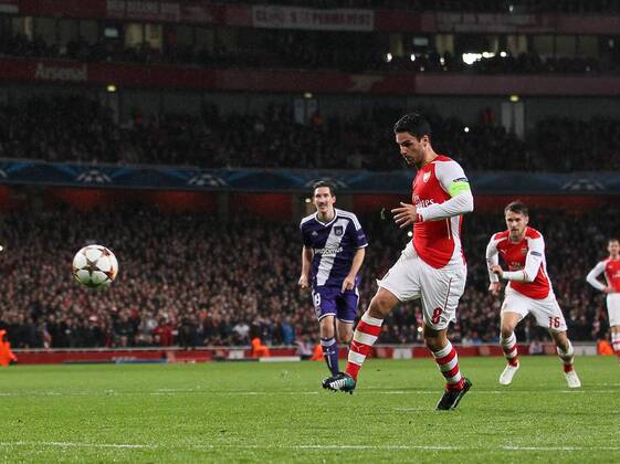 Arsenal s Mikel Arteta scoring his sides opening goal - Champions League Group D - Arsenal vs Anderlecht- Emirates Stadium - London - England - 4th November 2014 - Picture David Klein Sportimage EDITORIAL USE ONLY. No use with unauthorised audio, video, data, fixture lists, club league logos or live services. Online in-match use limited to 120 images, no video emulation. No use in betting, games or single club league player publications.