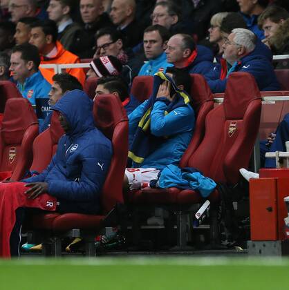 Arsenal s Mikel Arteta looks on dejected after going off injured - Champions League Group D - Arsenal vs Anderlecht- Emirates Stadium - London - England - 4th November 2014 - Picture David Klein Sportimage EDITORIAL USE ONLY. No use with unauthorised audio, video, data, fixture lists, club league logos or live services. Online in-match use limited to 120 images, no video emulation. No use in betting, games or single club league player publications.