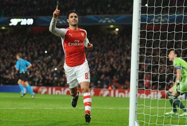 Aktuell Fussball, Champions League, FC Arsenal - RSC Anderlecht Football - 2014 2015 Champions League - Group D: Arsenal vs. Anderlecht Arsenal s Mikel Arteta celebrates scoring goal no 1 from the penalty spot at The Emirates. COLORSPORT ANDREW COWIE 