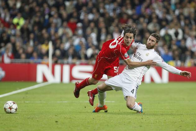 Real Madrid s Sergio Ramos (R) and Liverpool s Lazar Markovic during Champions League soccer match between Real Madrid and Liverpool at Santiago Bernabeu stadium in Madrid, Spain. November 04, 2014.  (20190896)