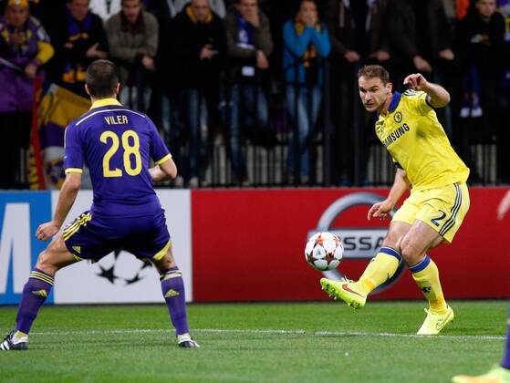 SOCCER - CL, Maribor vs Chelsea MARIBOR,SLOVENIA,05.NOV.14 - SOCCER - UEFA Champions League, group stage, NK Maribor vs Chelsea FC. Image shows Mitja Viler (Maribor) and Branislav Ivanovic (Chelsea). 
