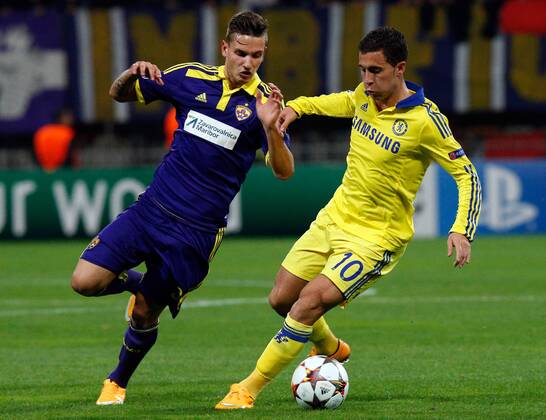 SOCCER - CL, Maribor vs Chelsea MARIBOR,SLOVENIA,05.NOV.14 - SOCCER - UEFA Champions League, group stage, NK Maribor vs Chelsea FC. Image shows Petar Stojanovic (Maribor) and Eden Hazard (Chelsea). 