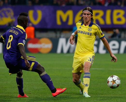 SOCCER - CL, Maribor vs Chelsea MARIBOR,SLOVENIA,05.NOV.14 - SOCCER - UEFA Champions League, group stage, NK Maribor vs Chelsea FC. Image shows Sintayehu Sallalich (Maribor) and Filipe Luis (Chelsea). 