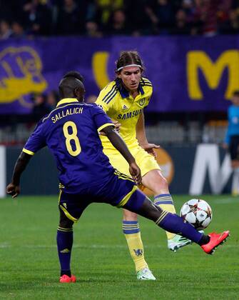 SOCCER - CL, Maribor vs Chelsea MARIBOR,SLOVENIA,05.NOV.14 - SOCCER - UEFA Champions League, group stage, NK Maribor vs Chelsea FC. Image shows Sintayehu Sallalich (Maribor) and Filipe Luis (Chelsea). 
