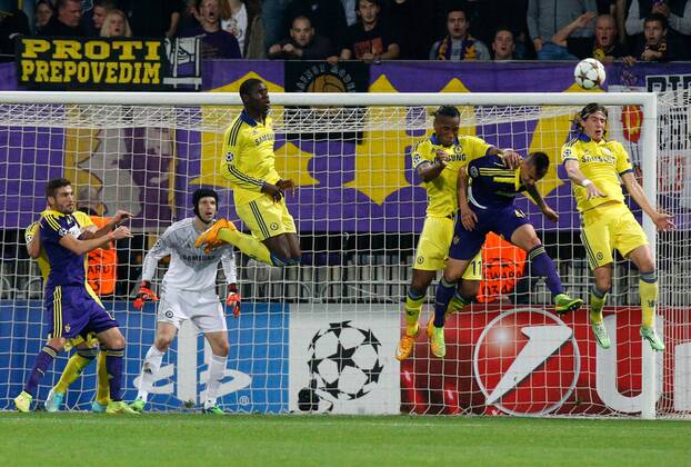 SOCCER - CL, Maribor vs Chelsea MARIBOR,SLOVENIA,05.NOV.14 - SOCCER - UEFA Champions League, group stage, NK Maribor vs Chelsea FC. Image shows Petr Cech, Kurt Zouma, Didier Drogba (Chelsea), Arghus (Maribor) and Filipe Luis (Chelsea). 