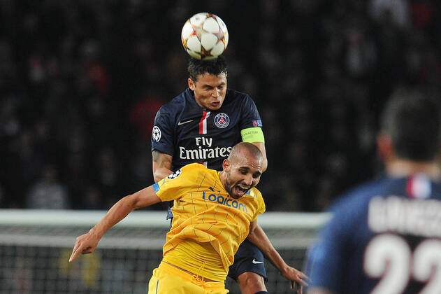 Aktuell Fussball, Champions League, Paris St. Germain - Apoel Nikosia 2 Thiago Silva (PSG) Rafik Djebbour (Apoel Nicosie) FOOTBALL : PSG vs Apoel Nicosie - Champion s League - 05 11 2014 N.LeGouic FEP Panoramic 