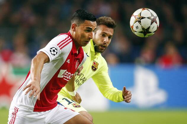 (L-R) Anwar El Ghazi of Ajax, Jordi Alba of FC Barcelona during the UEFA Champions League group f match between Ajax Amsterdam and Barcelona on November 4, 2014 at the Amsterdam Arena in Amsterdam, The Netherlands. Ajax Amsterdam v Barcelona UEFA Champions League Group F 2014 2015 xVIxxIVx 3246912