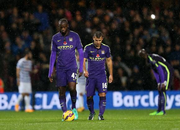 Manchester City s Yaya Toure looks on dejected after going 1-0 down - Barclays Premier League - Queens Park Rangers vs Manchester City- Loftus Road - London - England - 8th November 2014 - Picture David Klein Sportimage EDITORIAL USE ONLY. No use with unauthorised audio, video, data, fixture lists, club league logos or live services. Online in-match use limited to 120 images, no video emulation. No use in betting, games or single club league player publications.