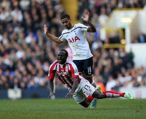 Tottenham s Kyle Naughton gets sent off for this tackle on Stoke s Victor Moses - Barclays Premier League - Tottenham Hotspur vs Stoke City- White Hart Lane - London - England - 9th November 2014 - Picture David Klein Sportimage EDITORIAL USE ONLY. No use with unauthorised audio, video, data, fixture lists, club league logos or live services. Online in-match use limited to 120 images, no video emulation. No use in betting, games or single club league player publications.