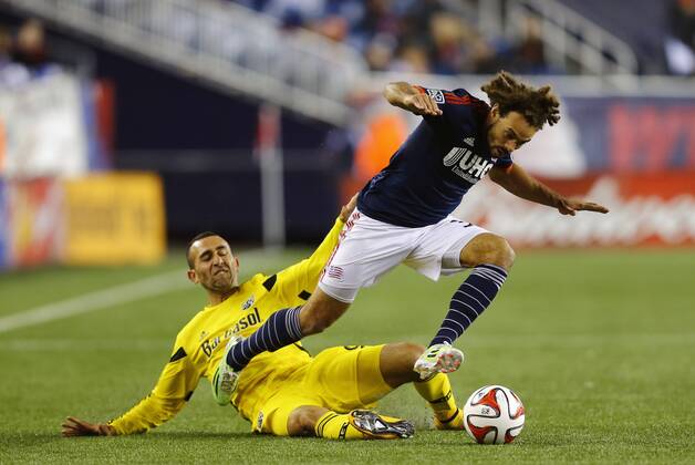 November 9, 2014: Columbus Crew s Justin Meram (9) takes down New England Revolution s Kevin Alston (30) for his first of two yellow cards. The New England Revolution defeated the Columbus Crew 3-1 in the second leg of the Major League Soccer Eastern Conference Semi-Finals at Gillette Stadium in Foxborough, Massachusetts. The Revolution win on aggregate goals 7-3 to advance to the Eastern Conference Finals. SOCCER: NOV 09 MLS Fussball Herren USA - Eastern Conference Semifinal - Crew SC at Revolution Icon20149883 EDITORIAL USE ONLY