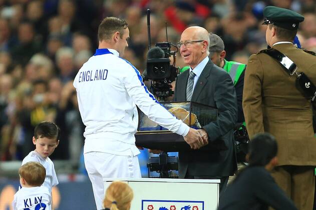 Sir Bobby Charlton presents Wayne Rooney of England with his 100th cap - England - EM Quali - Wembley Stadium - London - 15 11 2014 Pic PhilipxOldham Sportimage EDITORIAL USE ONLY. No use with unauthorised audio, video, data, fixture lists, club league logos or live services. Online in-match use limited to 120 images, no video emulation. No use in betting, games or single club league player publications.