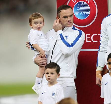 England s Wayne Rooney holds his sons Klay and Kai - International European Qualifier - England - - Wembley Stadium - London - England - 15th November 2014 - Picture DavidxKlein Sportimage EDITORIAL USE ONLY. No use with unauthorised audio, video, data, fixture lists, club league logos or live services. Online in-match use limited to 120 images, no video emulation. No use in betting, games or single club league player publications.