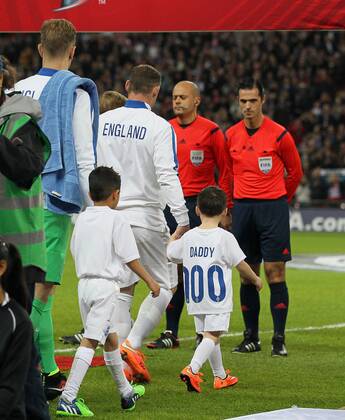 England s Wayne Rooney holds his sons Klay and Kai - International European Qualifier - England - - Wembley Stadium - London - England - 15th November 2014 - Picture DavidxKlein Sportimage EDITORIAL USE ONLY. No use with unauthorised audio, video, data, fixture lists, club league logos or live services. Online in-match use limited to 120 images, no video emulation. No use in betting, games or single club league player publications.