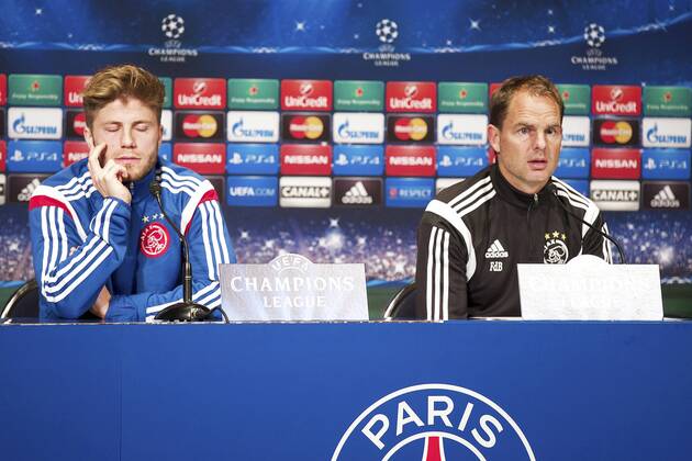 (L-R) Lasse Schone of Ajax, coach Frank de Boer of Ajax during a press conference of Ajax Amsterdam prior to the UEFA Champions League group F match between Paris Saint-Germain and Ajax on November 24, 2014 at the Parc de Princes stadium in Paris, France. Press conference Ajax in Paris UEFA Champions League Group F 2014 2015 xVIxxIVx 3298867