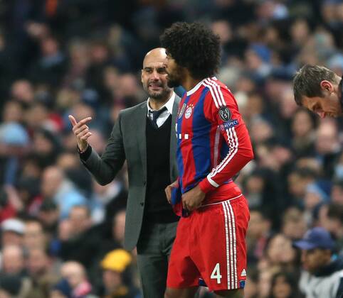 Josep Guardiola manager of Bayern Munich sends on Dante of Bayern Munich as a substitute following his teams red card - UEFA Champions League group E - Manchester City vs Bayern Munich - Etihad Stadium - Manchester - England - 25rd November 2014 - Picture Simon Bellis Sportimage EDITORIAL USE ONLY. No use with unauthorised audio, video, data, fixture lists, club league logos or live services. Online in-match use limited to 120 images, no video emulation. No use in betting, games or single club league player publications.