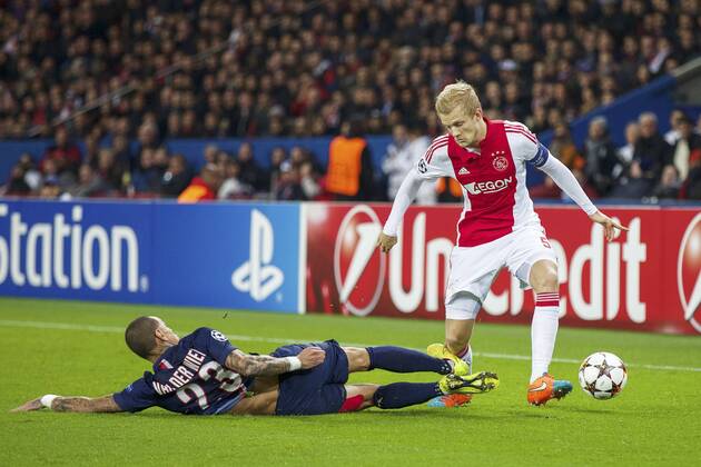 (L-R) Gregory van der Wiel of Paris Saint-Germain, Nicolai Boilesen of Ajax during the UEFA Champions League group F match between Paris Saint-Germain and Ajax Amsterdam on November 24, 2014 at the Parc de Princes stadium in Paris, France. Paris Saint-Germain v Ajax Amsterdam UEFA Champions League Group F 2014 2015 xVIxxIVx 3300952