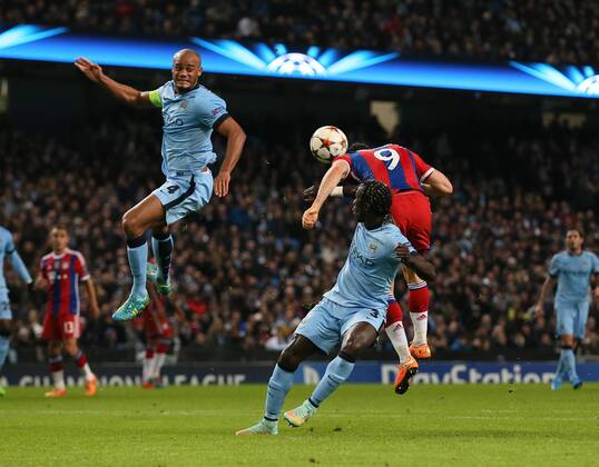Robert Lewandowski of Bayern Munich scores the second goal before half time - UEFA Champions League group E - Manchester City vs Bayern Munich - Etihad Stadium - Manchester - England - 25rd November 2014 - Picture Simon Bellis Sportimage EDITORIAL USE ONLY. No use with unauthorised audio, video, data, fixture lists, club league logos or live services. Online in-match use limited to 120 images, no video emulation. No use in betting, games or single club league player publications.
