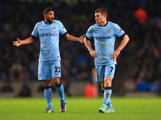 Gael Clichy and James Milner of Manchester City look dejected - Manchester City vs. Bayern Munich - UEFA Champion s League - Etihad Stadium - Manchester - 25 11 2014 Pic Philip Oldham Sportimage EDITORIAL USE ONLY. No use with unauthorised audio, video, data, fixture lists, club league logos or live services. Online in-match use limited to 120 images, no video emulation. No use in betting, games or single club league player publications.