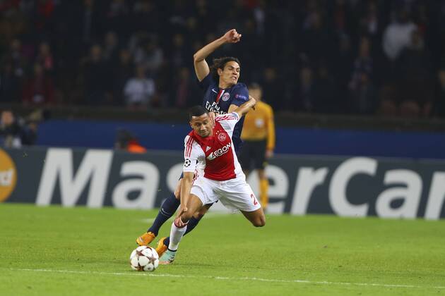 Ricardo Van Rhijn (AJAX) vs Edinson Cavani (PSG) FOOTBALL : Paris Saint Germain vs AJAX Amsterdam - Champions League - 25 11 2014 GwendolineLeGoff Panoramic 