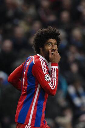 25.11.2014. Manchester, England. Champions League Group Stage. Manchester City versus Bayern Munich. Bayern Munich& x2019;s Dante can t contain his laughter after his side go 2-1 up xCraigxMercerx  ActionPlus11579142