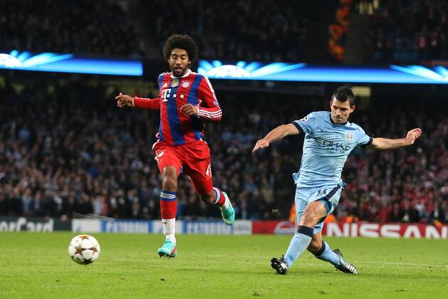 Sergio Kun Aguero of Manchester City scores the second goal to equalise - UEFA Champions League group E - Manchester City vs Bayern Munich - Etihad Stadium - Manchester - England - 25rd November 2014 - Picture Simon Bellis Sportimage EDITORIAL USE ONLY. No use with unauthorised audio, video, data, fixture lists, club league logos or live services. Online in-match use limited to 120 images, no video emulation. No use in betting, games or single club league player publications.