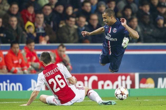 (L-R) Nick Viergever of Ajax, Lucas of Paris Saint-Germain during the UEFA Champions League group F match between Paris Saint-Germain and Ajax Amsterdam on November 24, 2014 at the Parc de Princes stadium in Paris, France. Paris Saint-Germain v Ajax Amsterdam UEFA Champions League Group F 2014 2015 xVIxxIVx 3301241