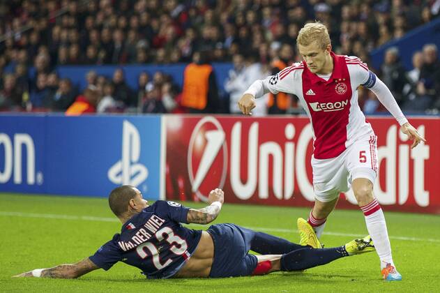 (L-R) Gregory van der Wiel of Paris Saint-Germain, Nicolai Boilesen of Ajax during the UEFA Champions League group F match between Paris Saint-Germain and Ajax Amsterdam on November 24, 2014 at the Parc de Princes stadium in Paris, France. Paris Saint-Germain v Ajax Amsterdam UEFA Champions League Group F 2014 2015 xVIxxIVx 3301523