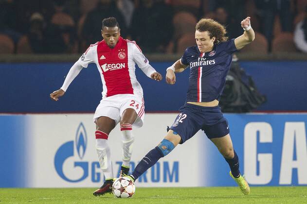 (L-R) Stefano Denswil of Ajax, David Luiz of Paris Saint-Germain during the UEFA Champions League group F match between Paris Saint-Germain and Ajax Amsterdam on November 24, 2014 at the Parc de Princes stadium in Paris, France. Paris Saint-Germain v Ajax Amsterdam UEFA Champions League Group F 2014 2015 xVIxxIVx 3301528