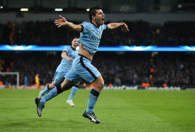 Sergio Kun Aguero of Manchester City celebrates scoring the winning goal - UEFA Champions League group E - Manchester City vs Bayern Munich - Etihad Stadium - Manchester - England - 25rd November 2014 - Picture Simon Bellis Sportimage EDITORIAL USE ONLY. No use with unauthorised audio, video, data, fixture lists, club league logos or live services. Online in-match use limited to 120 images, no video emulation. No use in betting, games or single club league player publications.