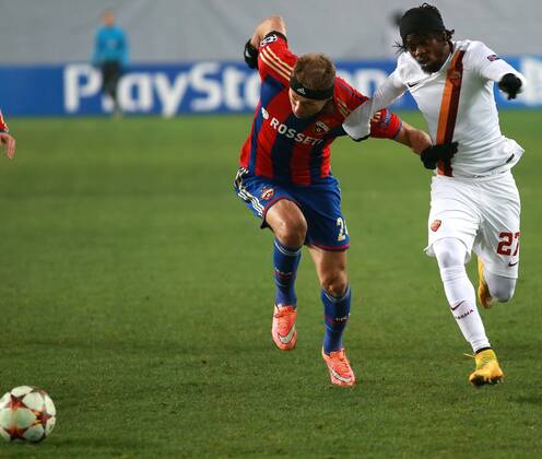 November 25, 2014. Russia, Khimki, arena New Khimki. CSKA s player Vasily Berezutsky and Roma s player Kouassi Gervinho in the 2014 15 UEFA Champions League s group stage match between CSKA (Moscow, Russia) and AS Roma (Rome, Italy) DmitryxGolubovich 