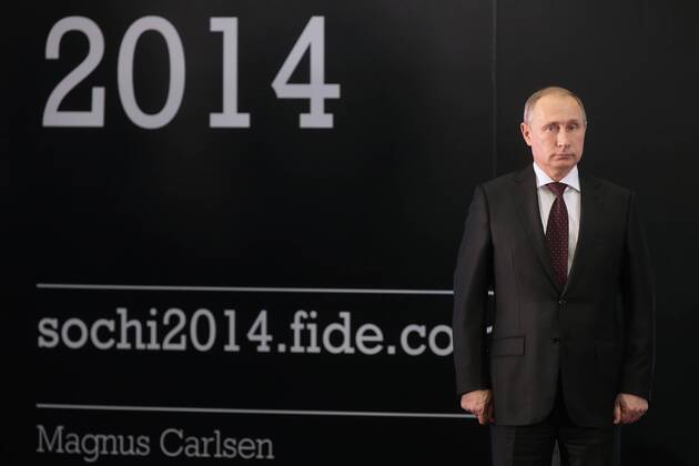 SOCHI, RUSSIA.NOVEMBER 25, 2014. Russia s president Vladimir Putin looks on at an awarding ceremony for the FIDE World Chess Championship 2014.  premiumd RE155C98