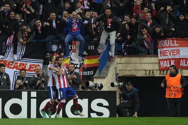 Aktuell Fussball, Champions League, Atletico Madrid - Atletico de Madrid Midfielder, Raul Garcia Escudero - RAUL GARCIA, number 8 celebrates after scoring a goal (1,0). Atletico de Madrid Midfielder, Grabiel Fenandez Arenas - GABI, number 14. Round 5 of the CHAMPIONS league soccer match between Atletico de Madrid - at the Vicente Calderon estadium Madrid - Spain by November 26 2014. 