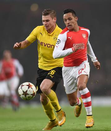 FUSSBALL CHAMPIONS LEAGUE SAISON 2014 2015 VORRUNDE Arsenal London - Borussia Dortmund 26.11.2014 Lukasz Piszczek (li, Borussia Dortmund) gegen Alexis Sanchez (re, Arsenal) 