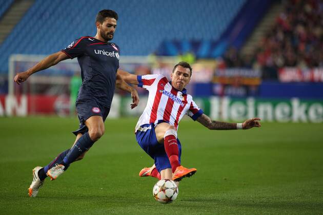Aktuell Fussball, Champions League, Atletico Madrid - Olympiakos Piräus Madrid, Spain. 26th November 2014: Mario Mandzukic, forward from Atletico de Madrid, in action during the UEFA Champions League group stage against Olympiacos FC at the Vicente Calderon stadium. (Photo: Ivan Abanades Medina). 