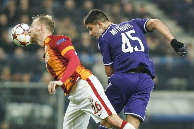 - BRUSSELS, BELGIUM: Anderlecht s Nicaise Kudimbana and Anderlecht s Alexandar Mitrovic fight for the ball during a game between Belgian soccer team RSCA Anderlecht and Turkish team Galatasaray, in Brussels, in the Constant Vanden Stock stadium, Wednesday 26 November 2014, on the fifth day of the group stage of the UEFA Champions League competition, in group D. THIERRYxROGE  x04509532x