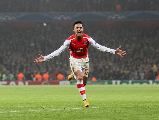 Arsenal s Alexis Sanchez celebrates scoring his sides second goal UEFA Champions League- Arsenal vs Borussia Dortmund- Emirates Stadium - England - 26th November 2014 - EDITORIAL USE ONLY. No use with unauthorised audio, video, data, fixture lists, club league logos or live services. Online in-match use limited to 120 images, no video emulation. No use in betting, games or single club league player publications.