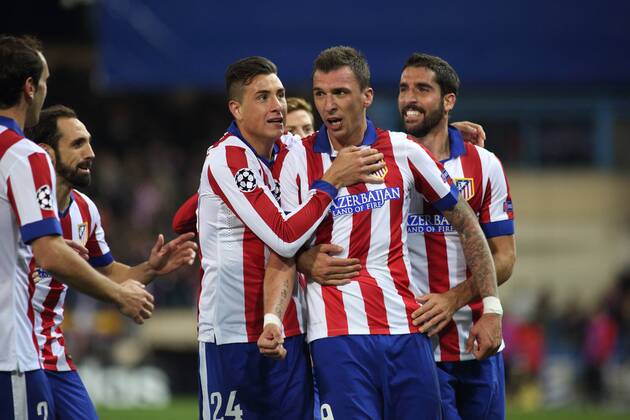 Madrid, Spain. 26th November 2014: Mario Mandzukic, forward from Atletico de Madrid, celebrating after scoring during the UEFA Champions League group stage against Olympiacos FC at the Vicente Calderon stadium. (Photo: Ivan Abanades Medina). 