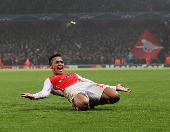 Arsenal s Alexis Sanchez celebrates scoring his sides second goal UEFA Champions League- Arsenal vs Borussia Dortmund- Emirates Stadium - England - 26th November 2014 - EDITORIAL USE ONLY. No use with unauthorised audio, video, data, fixture lists, club league logos or live services. Online in-match use limited to 120 images, no video emulation. No use in betting, games or single club league player publications.