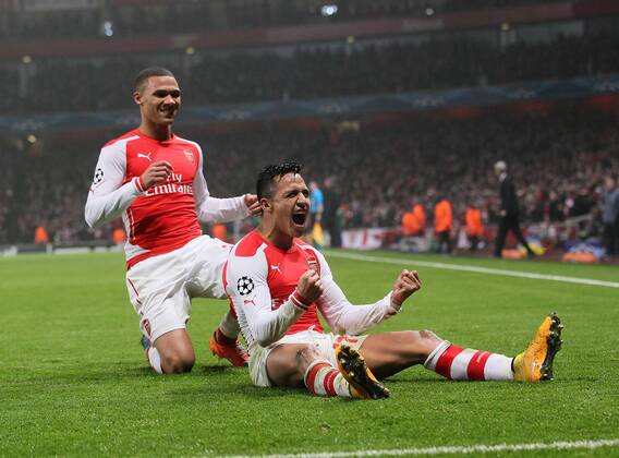 Arsenal s Alexis Sanchez celebrates scoring his sides second goal UEFA Champions League- Arsenal vs Borussia Dortmund- Emirates Stadium - England - 26th November 2014 - EDITORIAL USE ONLY. No use with unauthorised audio, video, data, fixture lists, club league logos or live services. Online in-match use limited to 120 images, no video emulation. No use in betting, games or single club league player publications.