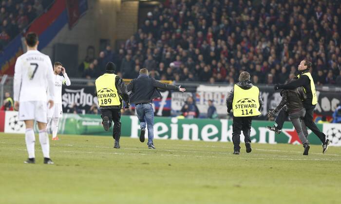 Champions League match between FC Basel and Real Madrid. In this picture, a streaker jumps into the pitch. xBEATRIZxGUZMANx 