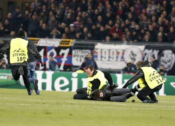 Champions League match between FC Basel and Real Madrid. In this picture, a streaker jumps into the pitch. xBEATRIZxGUZMANx 
