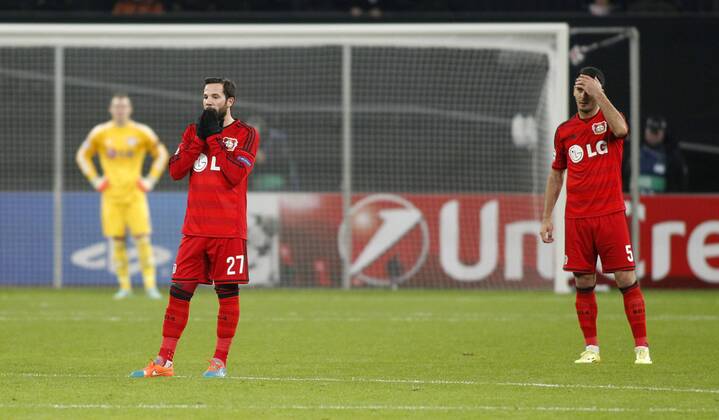 Leverkusens Gonzalo Castro (L) and Leverkusens Karim Bellarabi disappointed after the 0:1 during the Championsleague match between Bayer 04 Leverkusen and AS Monaco, Bayarena in Leverkusen on November 26., 2014. Bayer 04 Leverkusen vs. AS Monaco in der Champions League der Saison 2014 2015 am 26. November 2014.