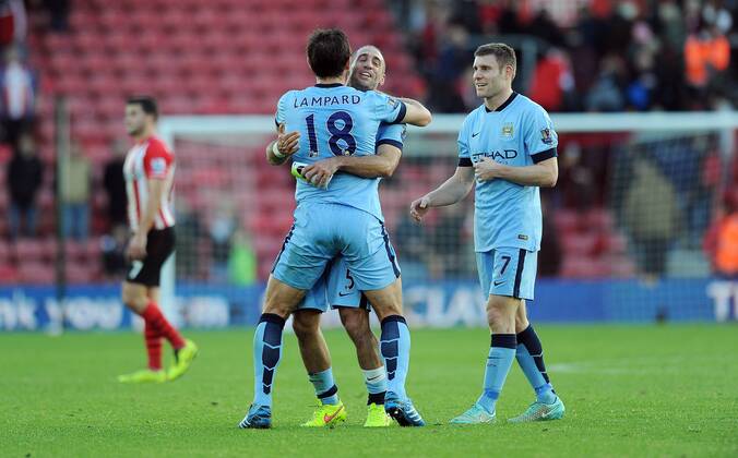 Aktuell Fußball, England, FC Southampton - Manchester City Frank Lampard of Manchester City celebrates with team mate Pablo Zabaleta of Manchester City at the end of the game - Barclays Premier League - Southampton vs Manchester City - St Mary s Stadium - Southampton - England - 30th November 2014 - Pic Robin Parker Sportimage EDITORIAL USE ONLY. No use with unauthorised audio, video, data, fixture lists, club league logos or live services. Online in-match use limited to 120 images, no video emulation. No use in betting, games or single club league player publications. TM3_2450.JPG