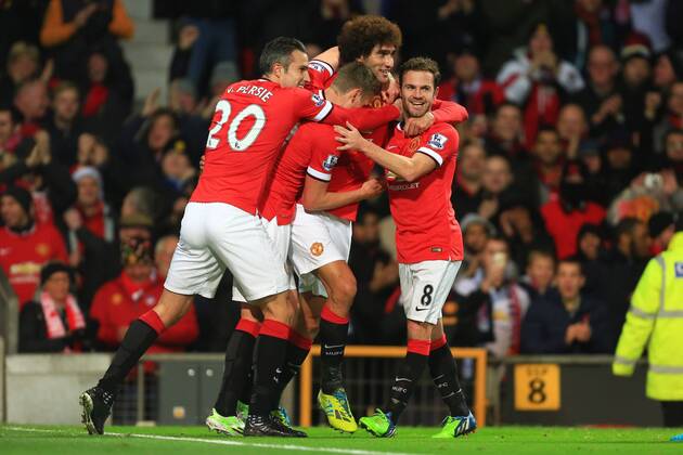 Marouane Fellaini of Manchester United ManU celebrates his opening goal - Manchester United vs. Stoke City - Barclay s Premier League - Old Trafford - Manchester - 02 12 2014 Pic Philip Oldham Sportimage EDITORIAL USE ONLY. No use with unauthorised audio, video, data, fixture lists, club league logos or live services. Online in-match use limited to 120 images, no video emulation. No use in betting, games or single club league player publications.