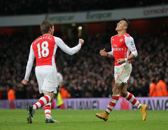Arsenal s Alexis Sanchez celebrates scoring his sides opening goal Barclays Premier League- Arsenal vs Southampton - Emirates Stadium - England - 3rd December 2014 - Picture David Klein Sportimage EDITORIAL USE ONLY. No use with unauthorised audio, video, data, fixture lists, club league logos or live services. Online in-match use limited to 120 images, no video emulation. No use in betting, games or single club league player publications.
