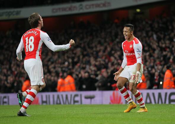 Arsenal s Alexis Sanchez celebrates scoring his sides opening goal Barclays Premier League- Arsenal vs Southampton - Emirates Stadium - England - 3rd December 2014 - Picture David Klein Sportimage EDITORIAL USE ONLY. No use with unauthorised audio, video, data, fixture lists, club league logos or live services. Online in-match use limited to 120 images, no video emulation. No use in betting, games or single club league player publications.